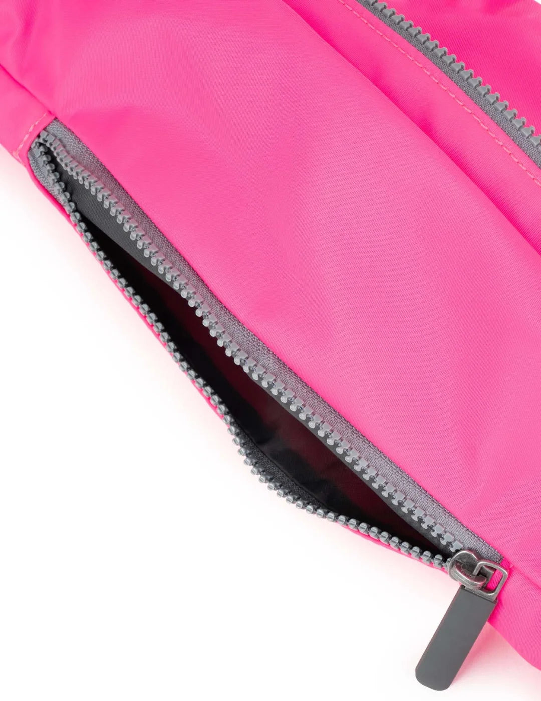 Riñonera ROKA Jubilee Neon Pink | Bicos de Fío